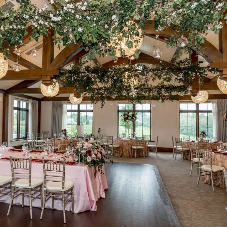 Gold Chiavari Chairs arranged in a Clubhouse Restaurant
